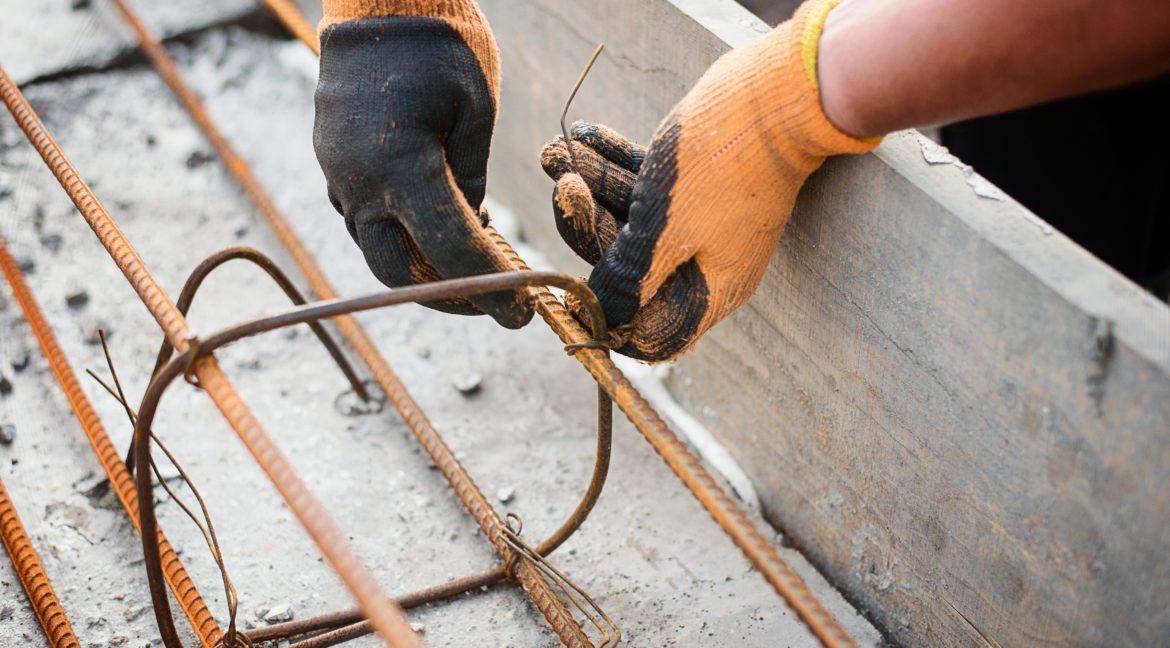 workers-make-a-structure-for-pouring-the-foundatio-2022-11-17-14-46-13-utc