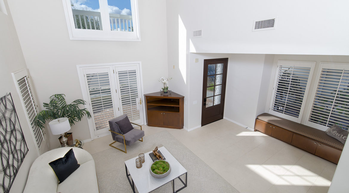 Living Room View from Staircase Landing at the Front Door