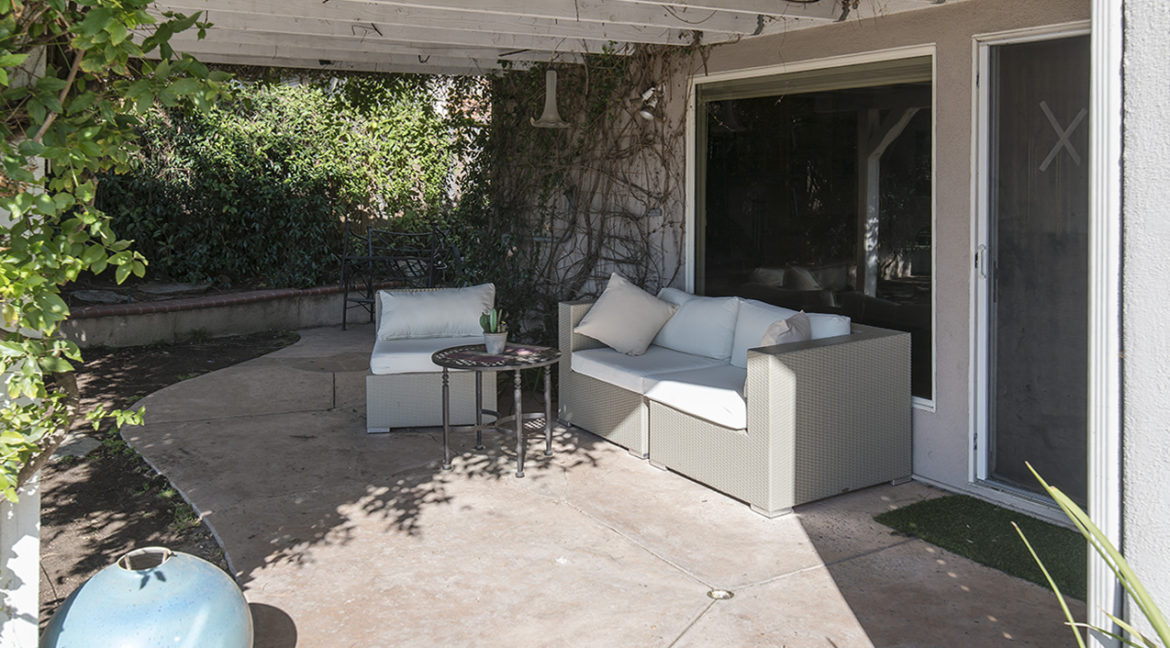 Covered patio with seating area